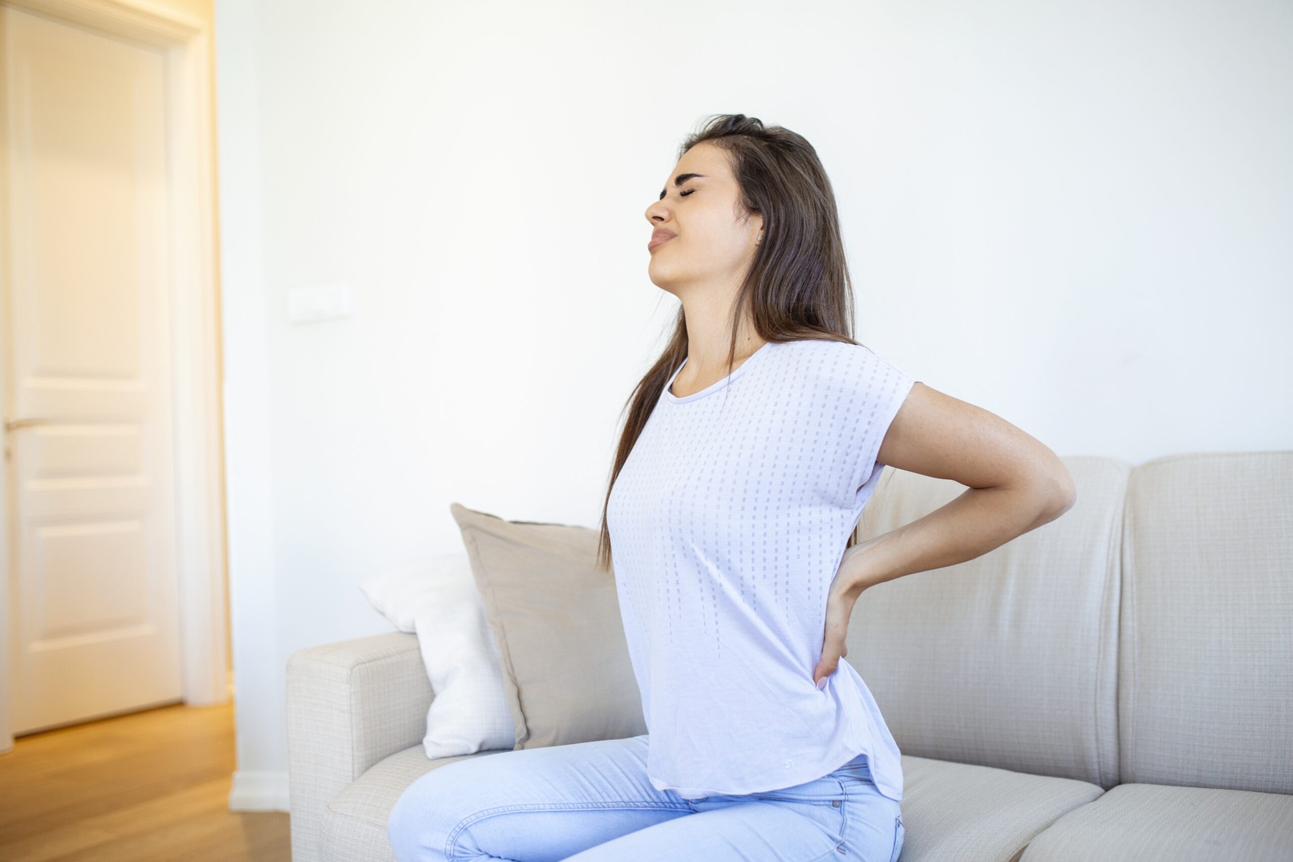 woman suffering from hip pain